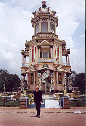 Dazz in front of pagoda at Cao Dai